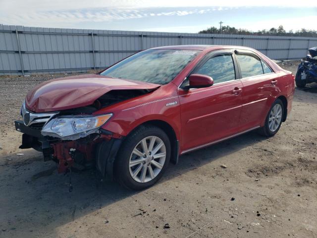 TOYOTA CAMRY HYBR 2014 with VIN 4T1BD1FK0EU101319 - Photo from auction