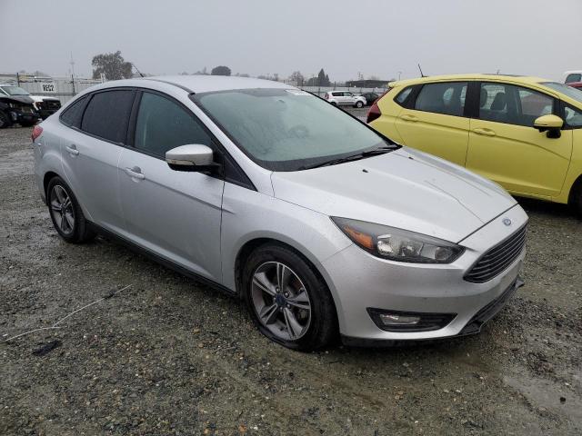Photo 4 from auction – 2017 FORD FOCUS SE with VIN 1FADP3FE0HL285199