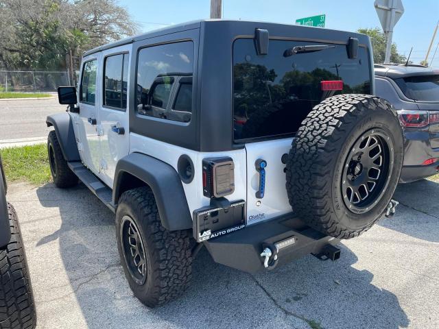 Photo 3 from auction – 2016 JEEP WRANGLER U with VIN 1C4BJWDGXGL213370