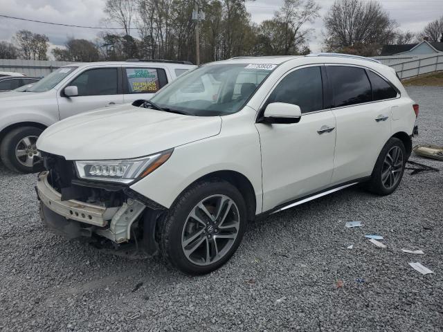 ACURA MDX 2017 with VIN 5FRYD4H92HB001602 - Photo from auction