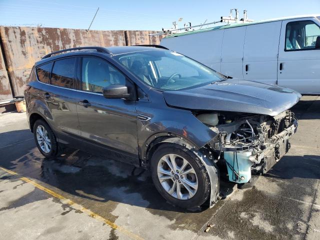 Photo 4 from auction – 2018 FORD ESCAPE SE with VIN 1FMCU0GD0JUA43088
