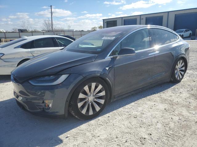 TESLA MODEL X 2019 with VIN 5YJXCBE2XKF184704 - Photo from auction