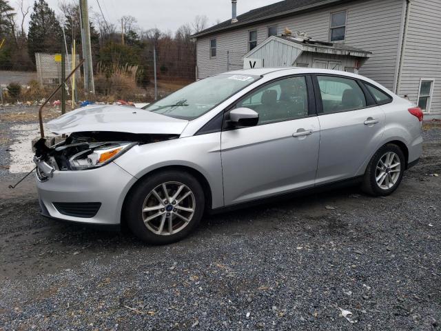 FORD FOCUS SE 2017 with VIN 1FADP3F29HL323003 - Photo from auction