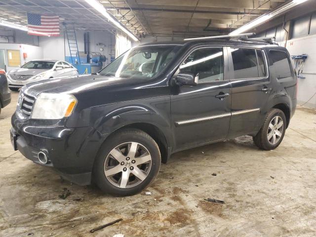 HONDA PILOT TOUR 2014 with VIN 5FNYF4H95EB052910 - Photo from auction