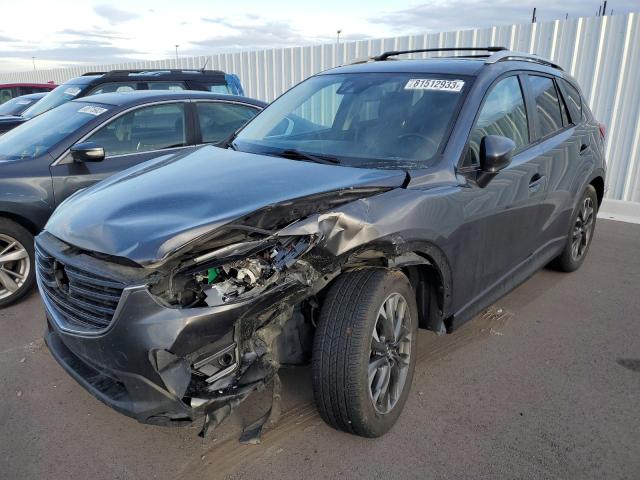MAZDA CX-5 GT 2016 with VIN JM3KE4DY1G0854885 - Photo from auction