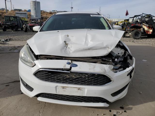 Photo 5 from auction – 2016 FORD FOCUS SE with VIN 1FADP3K25GL331443