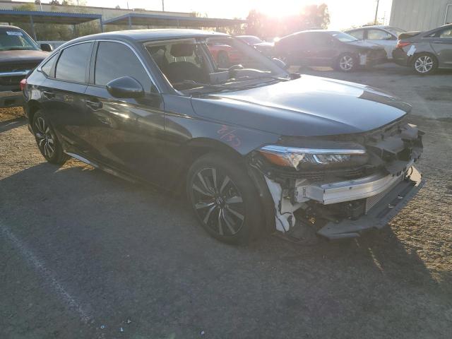 Photo 4 from auction – 2022 HONDA CIVIC EX with VIN JHMFE1F75NX008470