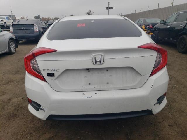 Photo 6 from auction – 2017 HONDA CIVIC LX with VIN 2HGFC2F54HH574206