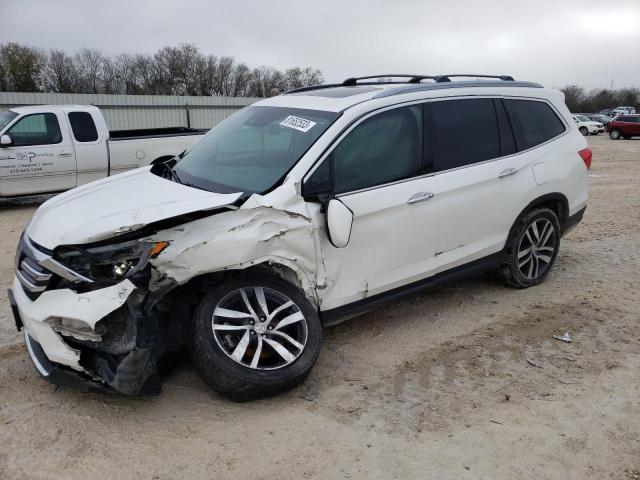 HONDA PILOT ELIT 2017 with VIN 5FNYF6H06HB056952 - Photo from auction