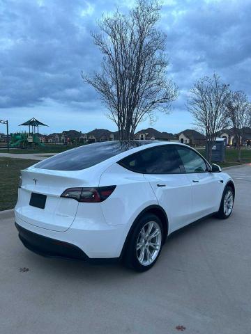 Photo 4 from auction – 2022 TESLA MODEL Y with VIN 7SAYGAEE0NF315854