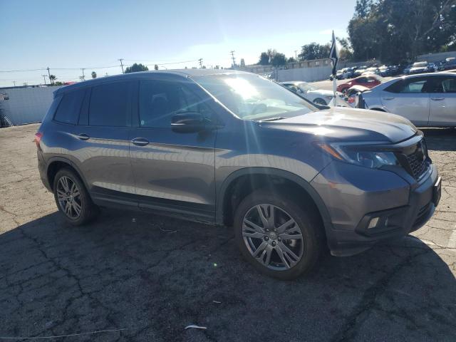 Photo 4 from auction – 2021 HONDA PASSPORT E with VIN 5FNYF8H50MB024662