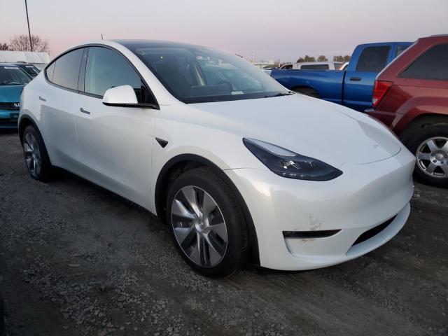 Photo 4 from auction – 2023 TESLA MODEL Y with VIN 7SAYGDEE6PF748499