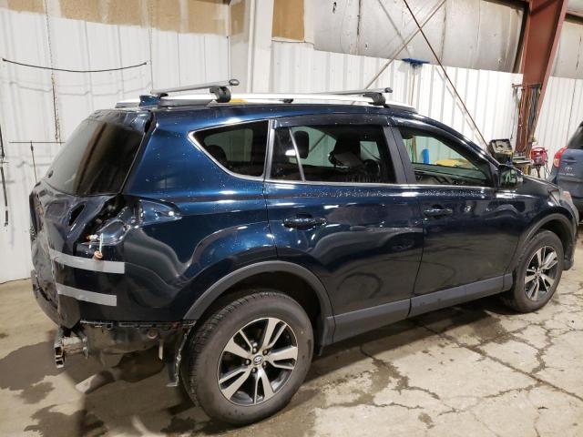 Photo 3 from auction – 2018 TOYOTA RAV4 XLE with VIN 2T3RFREV4JW782668