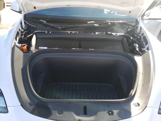 Photo 12 from auction – 2023 TESLA MODEL Y with VIN 7SAYGDEE0PA064366