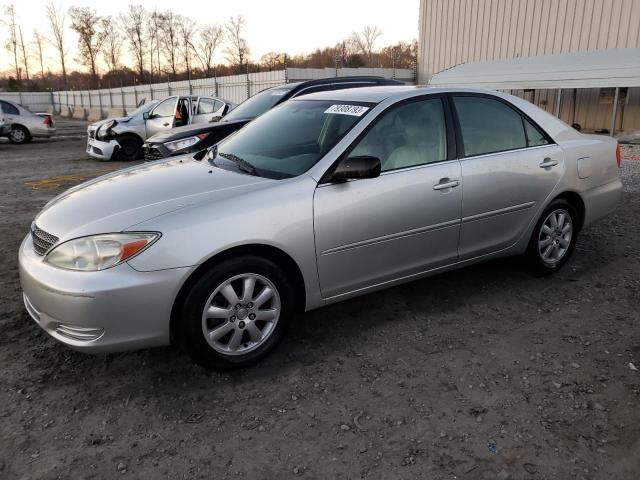 TOYOTA CAMRY LE 2002 with VIN JTDBF30K920035472 - Photo from auction