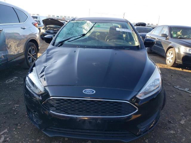 Photo 5 from auction – 2018 FORD FOCUS SE with VIN 1FADP3F21JL209762