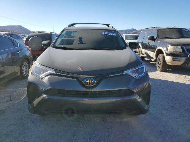 Photo 5 from auction – 2018 TOYOTA RAV4 LE with VIN 2T3ZFREV0JW512840