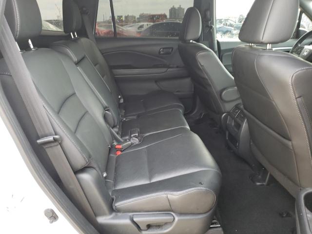 Photo 11 from auction – 2023 HONDA PASSPORT E with VIN 5FNYF8H52PB011822