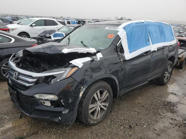 HONDA PILOT EXL 2017 with VIN 5FNYF6H55HB063645 - Photo from auction