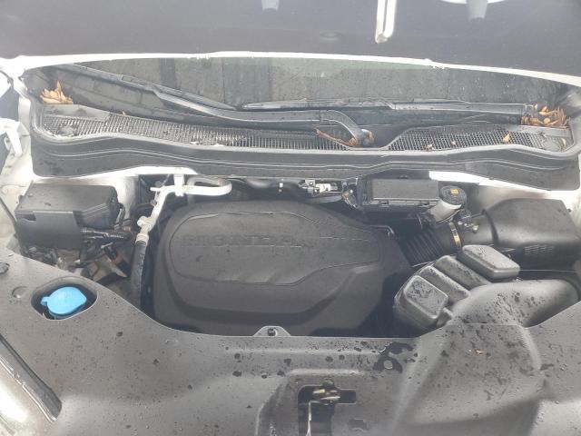 Photo 12 from auction – 2023 HONDA PASSPORT E with VIN 5FNYF8H54PB029528