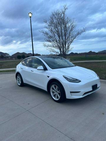 TESLA MODEL Y 2022 with VIN 7SAYGAEE0NF315854 - Photo from auction