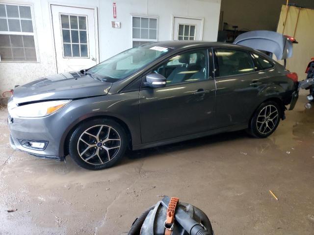 FORD FOCUS SE 2016 with VIN 1FADP3F2XGL257690 - Photo from auction