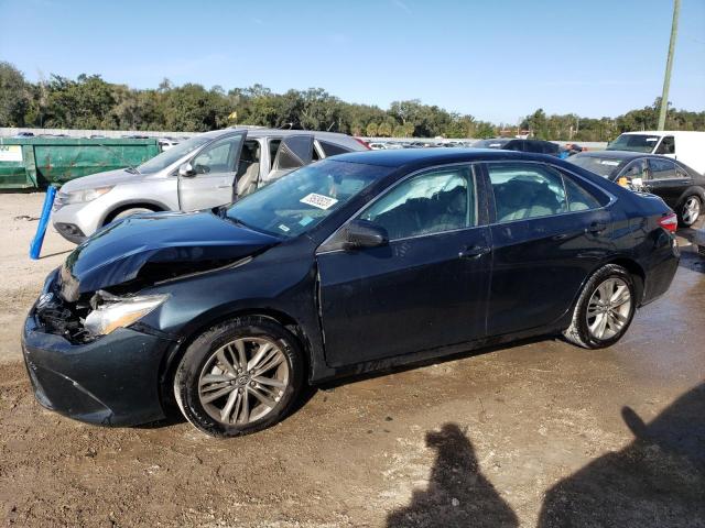 TOYOTA CAMRY LE 2015 with VIN 4T1BF1FKXFU102411 - Photo from auction