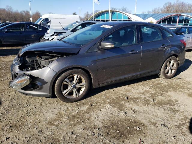 FORD FOCUS SE 2014 with VIN 1FADP3F23EL386108 - Photo from auction