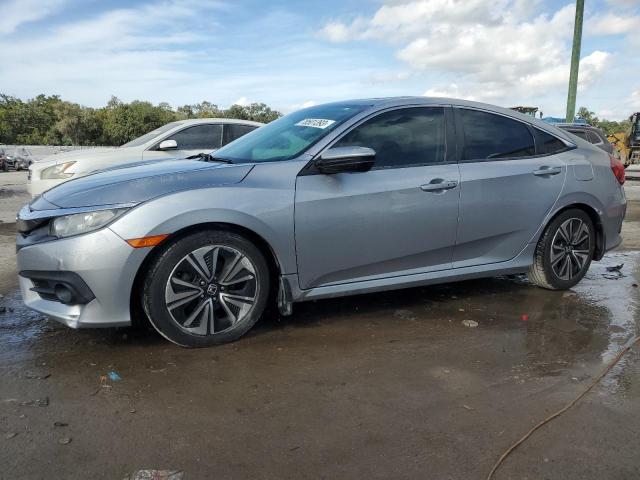 HONDA CIVIC EXL 2016 with VIN 19XFC1F74GE034620 - Photo from auction