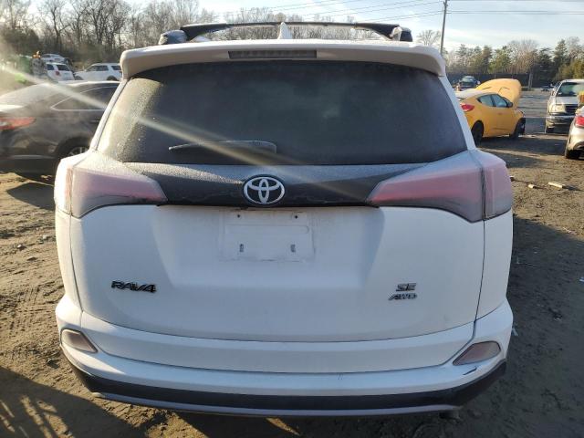 Photo 6 from auction – 2018 TOYOTA RAV4 SE with VIN JTMJFREV6JD242121