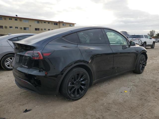 Photo 3 from auction – 2022 TESLA MODEL Y with VIN 7SAYGAEE6NF335851