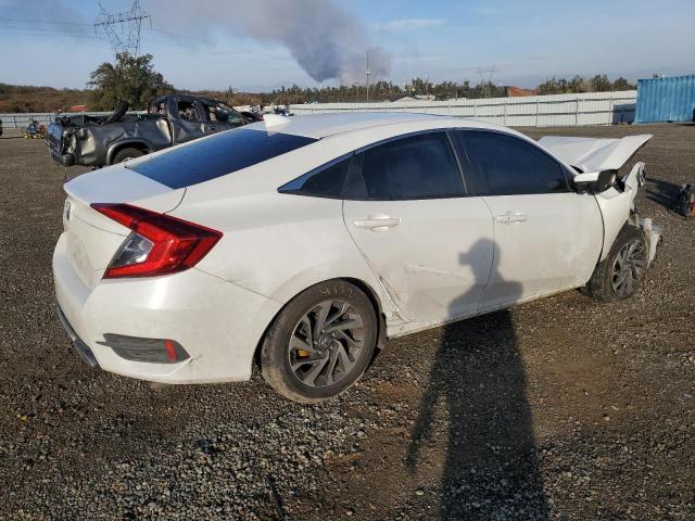 Photo 3 from auction – 2018 HONDA CIVIC EX with VIN 2HGFC2F70JH533417