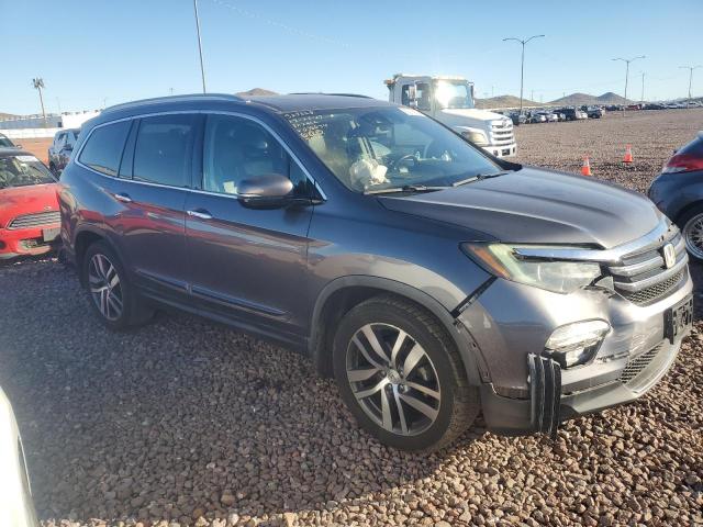 Photo 4 from auction – 2016 HONDA PILOT ELIT with VIN 5FNYF6H03GB038634