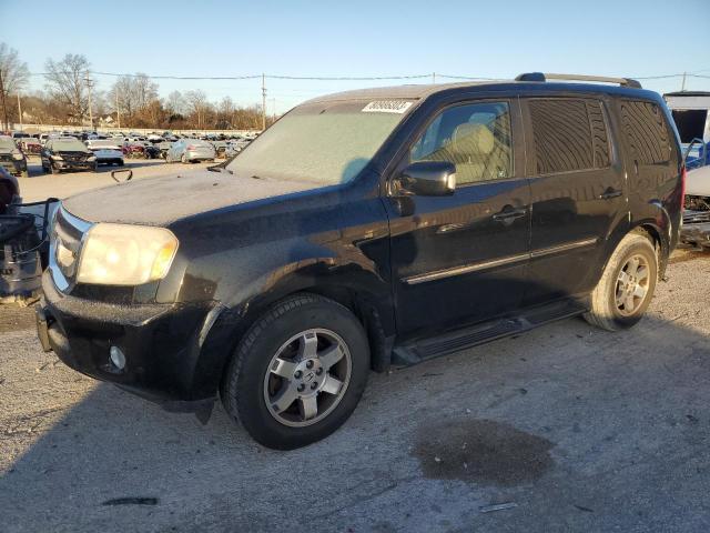 HONDA PILOT TOUR 2011 with VIN 5FNYF4H9XBB004623 - Photo from auction