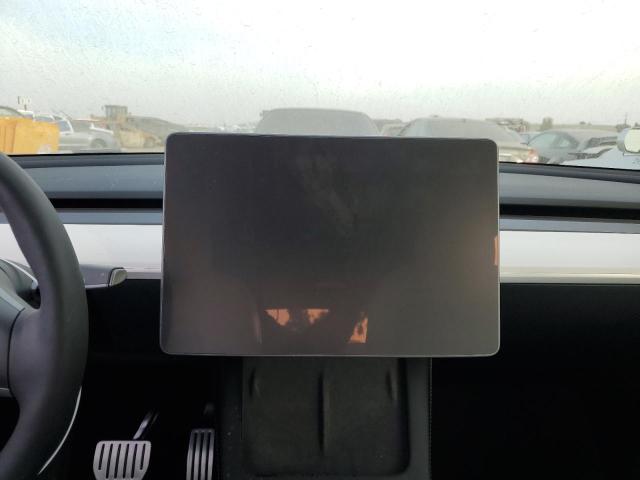 Photo 9 from auction – 2022 TESLA MODEL Y with VIN 7SAYGDEF0NF490051