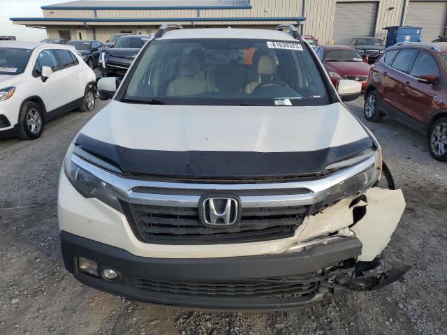 Photo 5 from auction – 2017 HONDA RIDGELINE with VIN 5FPYK2F64HB011575