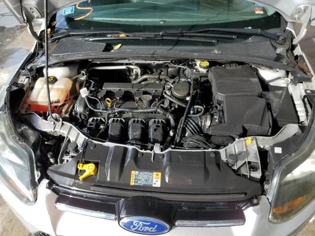 Photo 11 from auction – 2014 FORD FOCUS TITA with VIN 1FADP3J23EL339071