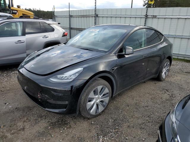 TESLA MODEL Y 2023 con VIN 7SAYGDEE9PA097964 - Foto de la subasta