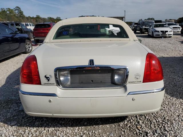 Photo 6 from auction – 2003 LINCOLN TOWN CAR C with VIN 1LNHM83W23Y670608