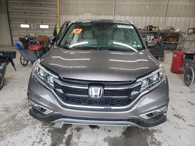 Photo 5 from auction – 2016 HONDA CR-V TOURI with VIN 5J6RM4H91GL080840