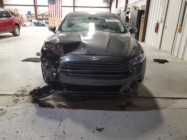 Photo 5 from auction – 2016 FORD FUSION TIT with VIN 3FA6P0SUXGR183090