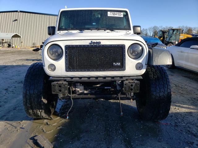 Photo 5 from auction – 2014 JEEP WRANGLER U with VIN 1C4BJWFG9EL279144