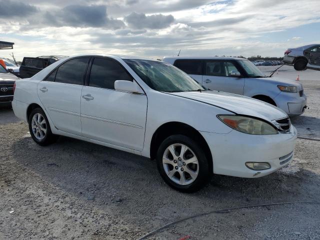 Photo 4 from auction – 2004 TOYOTA CAMRY LE with VIN JTDBE32K440248493