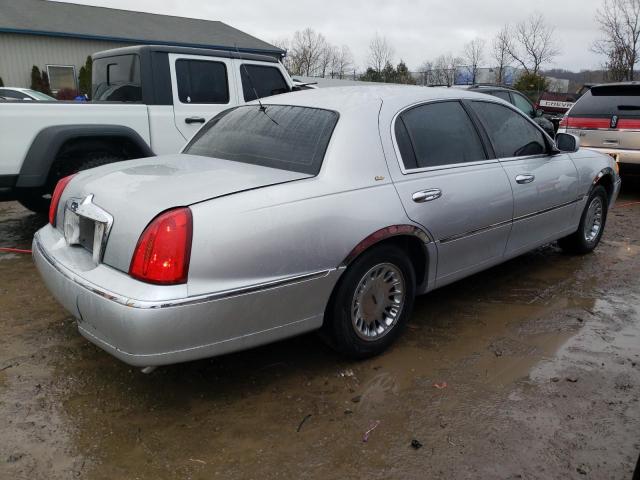 Photo 3 from auction – 2000 LINCOLN TOWN CAR C with VIN 1LNHM83W9YY877049