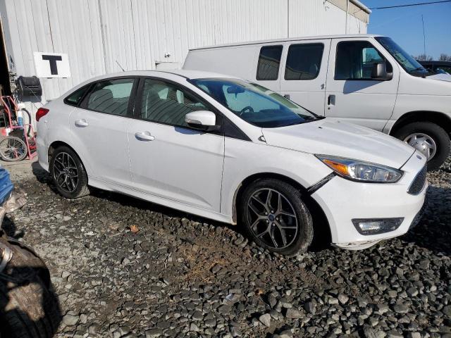 Photo 4 from auction – 2015 FORD FOCUS SE with VIN 1FADP3F20FL338244