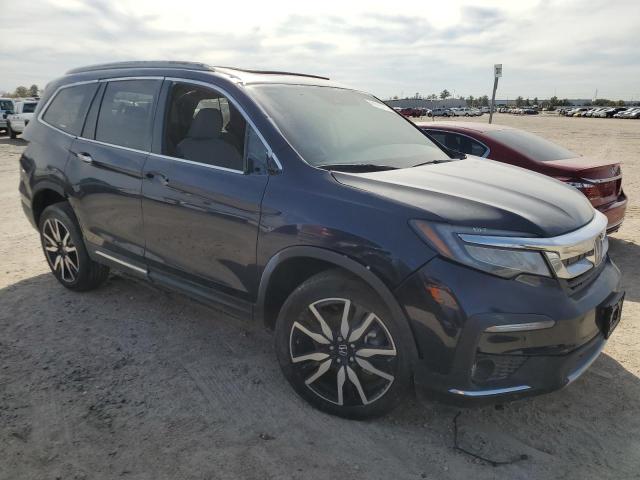 Photo 4 from auction – 2022 HONDA PILOT ELIT with VIN 5FNYF6H01NB047460