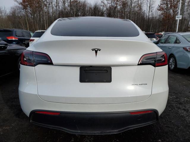 Photo 6 from auction – 2023 TESLA MODEL Y with VIN 7SAYGAEE7PF671446