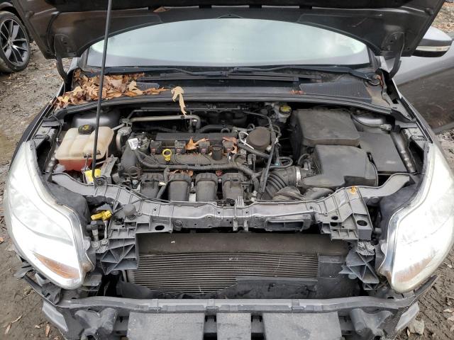 Foto 11 de la subasta – 2014 FORD FOCUS SE con VIN 1FADP3F21EL448220