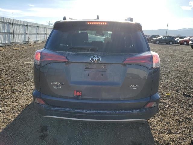Photo 6 from auction – 2017 TOYOTA RAV4 XLE with VIN JTMRFREVXHD216263