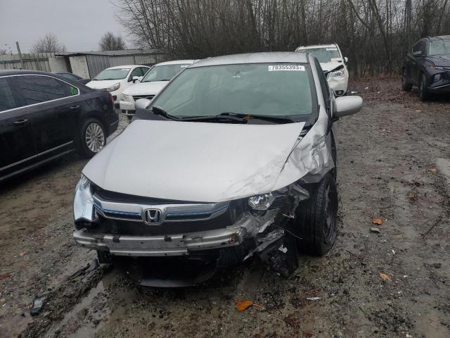 Photo 5 from auction – 2014 HONDA INSIGHT LX with VIN JHMZE2H51ES002595
